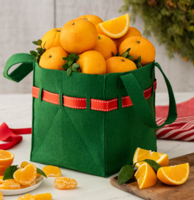 Green and Red Holiday Tote Bag filled with Oranges and Tangerines.